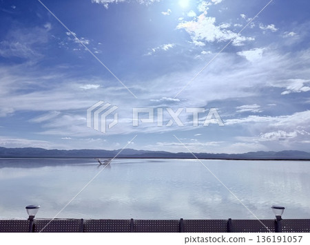 Beautiful clouds over the lake 136191057