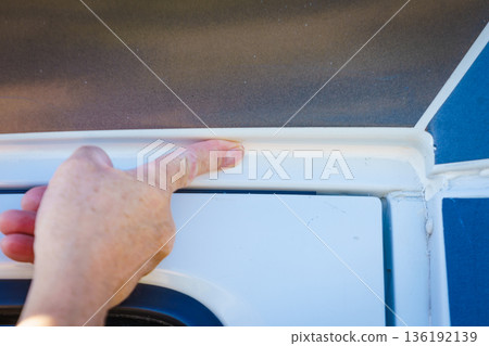 Applying silicon on caravan body Applying silicon on caravan body 136192139