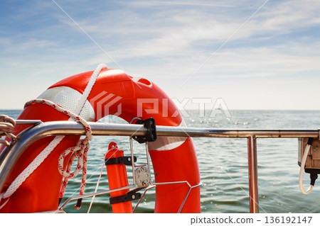 Rescue ring on sailing boat during cruise 136192147