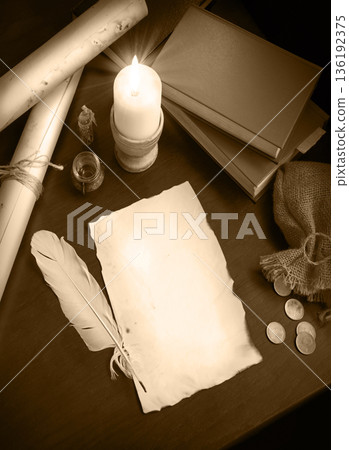 Paper and quill on the table 136192375