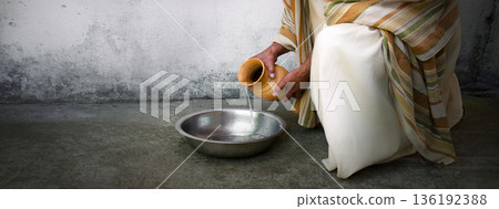 Man pour water into bowl 136192388