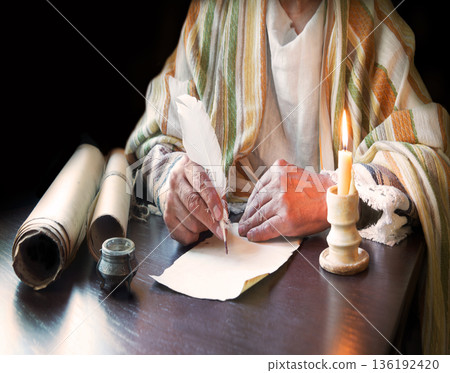 Male hand witn big quill 136192420