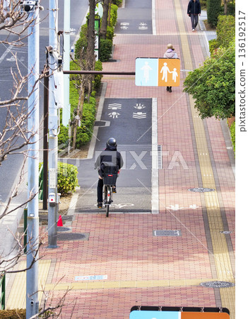 Sidewalks with separate lanes for bicycles and pedestrians Sidewalks with separate lanes for bicycles and pedestrians 136192517