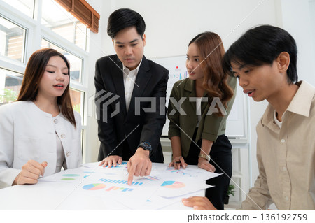 Young asian business team collaboration on project in modern office. 136192759