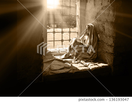 Lone girl sitting in the castle Lone girl sitting in the castle 136193047