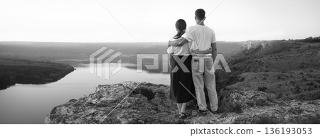 Girl and guy on the hill Girl and guy on the hill 136193053
