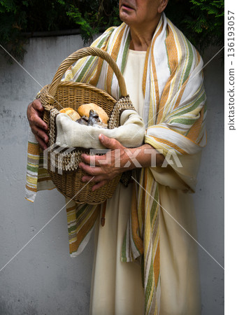 Old man with ancient basket 136193057