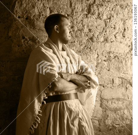 Ancient man at the window 136193067
