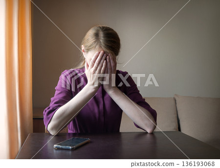 Sad girl praying to God Sad girl praying to God 136193068
