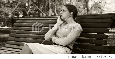 Sad girl praying to God 136193069