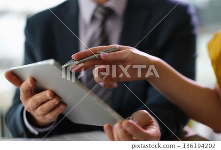 Collaborative discussion in a modern office setting with technology and teamwork 136194202