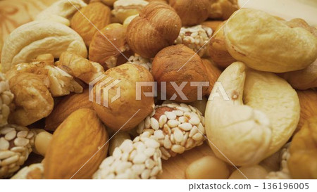 Mixed nuts and seeds creating a healthy snack Mixed nuts and seeds creating a healthy snack 136196005