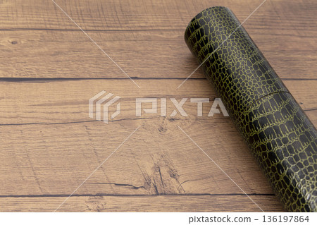 Graduation certificate placed on a wood background Graduation certificate placed on a wood background 136197864