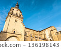 Low-angle view of Santa Maria Cathedral in Vitoria-Gasteiz, showing its stone bell tower, Gothic 136198143