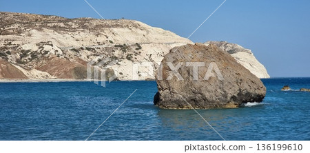 Dramatic Cyprus Cliffs with Large Rock and Azure Sea Dramatic Cyprus Cliffs with Large Rock and Azure Sea 136199610