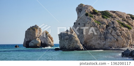 Towering Cyprus Sea Rocks with Vegetation and Blue Horizon Towering Cyprus Sea Rocks with Vegetation and Blue Horizon 136200117
