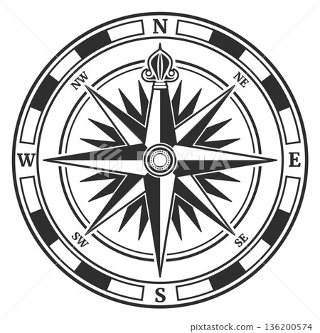 A compass with the needle pointing to the north A compass with the needle pointing to the north 136200574