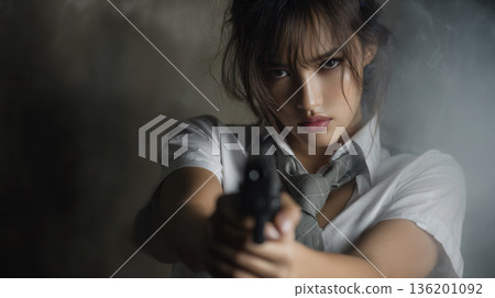 young Asian girl holding a pistol gun 136201092