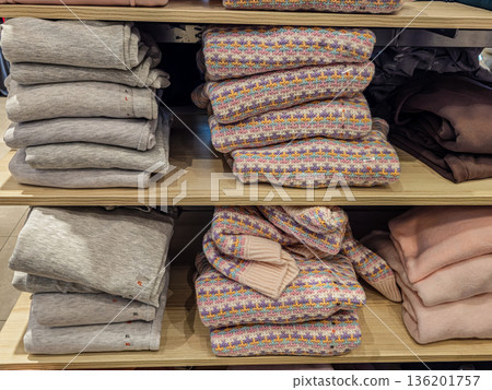 Pastel Sweaters Stacked on Store Shelf Horizontal Pastel Sweaters Stacked on Store Shelf Horizontal 136201757