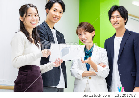 Business people standing and having a meeting in the office 136201798