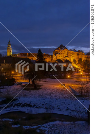 Cesky Krumlov Castle and tower illuminated at dusk 136201871