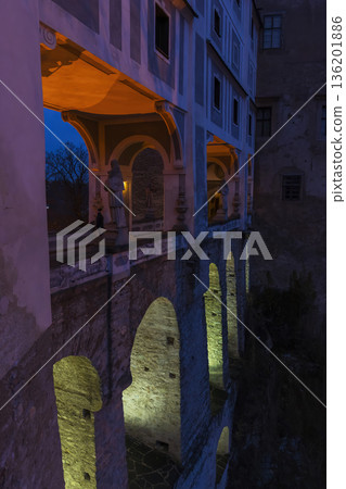 Illuminated Cloister Arches of Cesky Krumlov Castle at Dusk 136201886