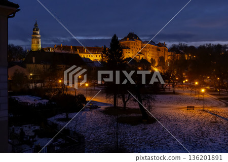 Cesky Krumlov Castle with tower illuminating winter night Cesky Krumlov Castle with tower illuminating winter night 136201891