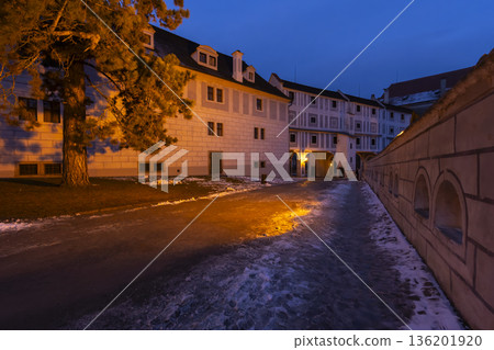 Cesky Krumlov castle illuminated alley at twilight 136201920