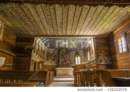 Traditional wooden church interior with ornate painted ceiling in Zuberec, Slovakia Traditional wooden church interior with ornate painted ceiling in Zuberec, Slovakia 136202078