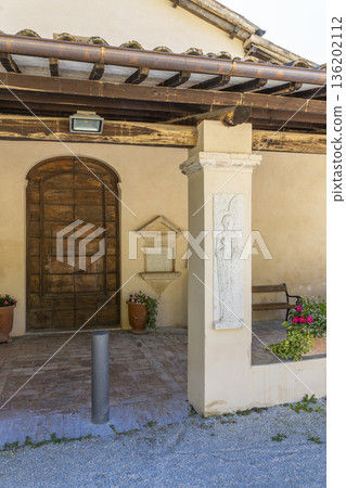 Traditional Italian architecture with relief sculpture in Foligno, Umbria Traditional Italian architecture with relief sculpture in Foligno, Umbria 136202112