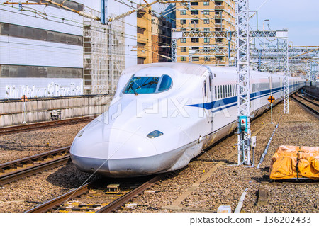 Yokohama cityscape in Japan: Inbound tourism continues...View of the Shinkansen in front of Shin-Yokohama Station and Yokohama Prince Hotel (left). To the future Yokohama cityscape in Japan: Inbound tourism continues...View of the Shinkansen in front of Shin-Yokohama Station and Yokohama Prince Hotel (left). To the future 136202433