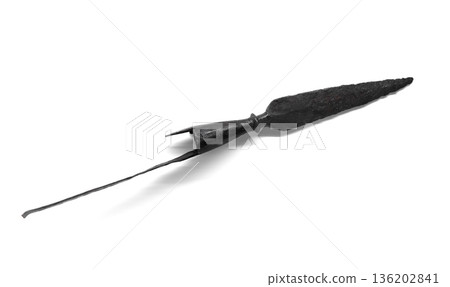 A weathered iron spearhead isolated on white background A weathered iron spearhead isolated on white background 136202841