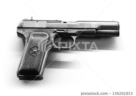 Close-up of a Soviet TT pistol on white background 136202853