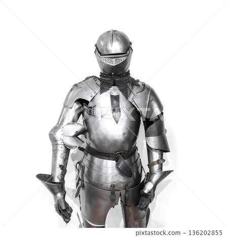 A medieval knight clad in gleaming full plate armor 136202855