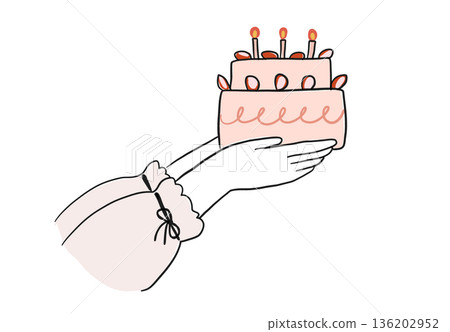 A woman's hand offering a cake A woman's hand offering a cake 136202952