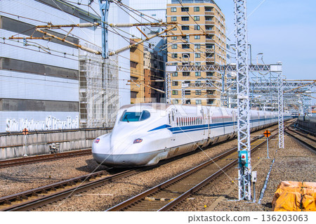 Yokohama cityscape in Japan: Inbound tourism continues...View of the Shinkansen in front of Shin-Yokohama Station and Yokohama Prince Hotel (left). To the future 136203063