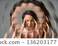 Woman suffering from headache or migraine with multiple exposure effect 136203177