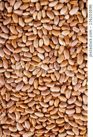 Raw Beans background, white beans on a table Raw Beans background, white beans on a table 136203696