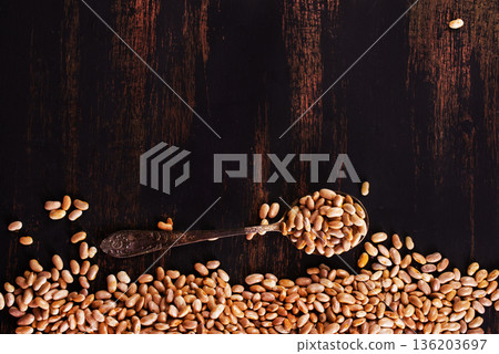 Raw Beans background, white beans on a table Raw Beans background, white beans on a table 136203697