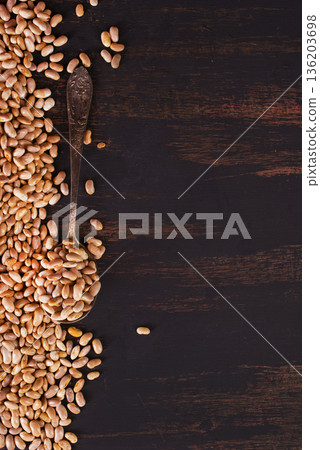 Raw Beans background, white beans on a table Raw Beans background, white beans on a table 136203698