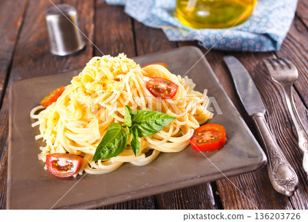 Tasty appetizing classic italian spaghetti pasta with tomato sauce, cheese parmesan and basil 136203726