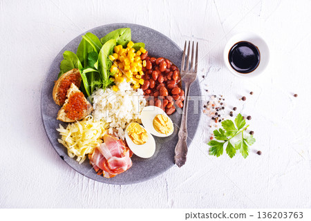 Organic sunny side egg with bacon with vegetables. Healthy keto breakfast. Organic sunny side egg with bacon with vegetables. Healthy keto breakfast. 136203763