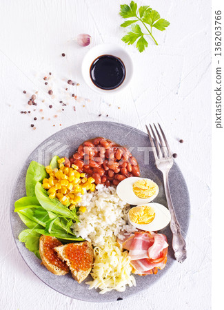 Organic sunny side egg with bacon with vegetables. Healthy keto breakfast. 136203766