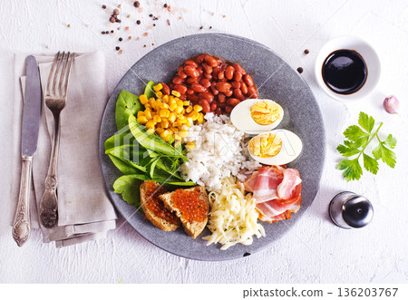 Organic sunny side egg with bacon with vegetables. Healthy keto breakfast. Organic sunny side egg with bacon with vegetables. Healthy keto breakfast. 136203767