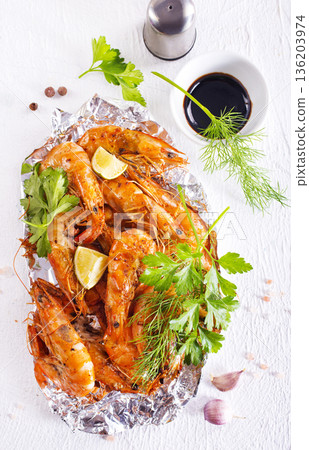 boiled shrimps with spice on metal plate 136203974