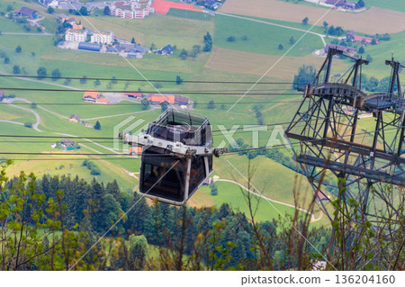 Gondola of Stanserhorn cabrio cable car to Stanserhorn mountain in Switzerland Gondola of Stanserhorn cabrio cable car to Stanserhorn mountain in Switzerland 136204160