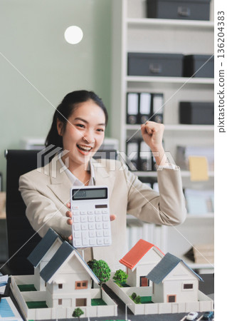 real estate agent home miniature model on documents sale and purchase of apartment notarial deed real estate agent home miniature model on documents sale and purchase of apartment notarial deed 136204383