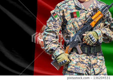 Afghanistan flag with soldier holding assault rifle 136204531