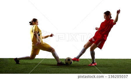Female soccer player blocking free kick attempt in training duel. 136205037