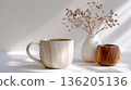 white coffee cup on wooden table 136205136